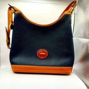 EUC Vintage Dooney and Bourke All Weather Leather Navy and Tan Pebbled Leather